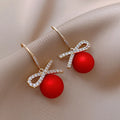 the BELLE OF THE BALL - Luxury Gold Color Zircon Bowknot Stud Earrings Red Pearl Flower Festive Earring New Year Christmas Jewelry Gifts