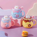 the DONUT CAT CUP - Cute Donut Ceramic Coffee Mug with 3D Animal Cat Lid and Stirrer
