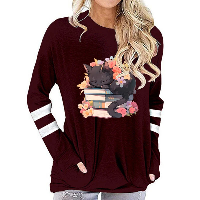 the BOOKWORM CAT - Cartoon Cat with Book Print Cotton Loose Autumn Book Lovers Long Sleeve T-Shirts for Women