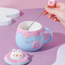 the DONUT CAT CUP - Cute Donut Ceramic Coffee Mug with 3D Animal Cat Lid and Stirrer