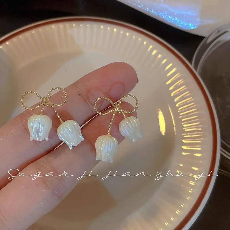 the WHITE TULIPS - Fashion Hollow Bowknot White Tulip Fritillary Stud Earring Christmas Gift