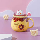 the DONUT CAT CUP - Cute Donut Ceramic Coffee Mug with 3D Animal Cat Lid and Stirrer