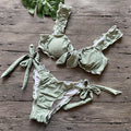 the DAISY - Solid Color Ruffled Swimwear Bathing Suit