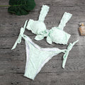 the DAISY - Solid Color Ruffled Swimwear Bathing Suit